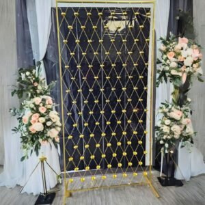 gold candle wall backdrop with candle holders